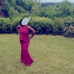 Magenta long peplum trumpet gown